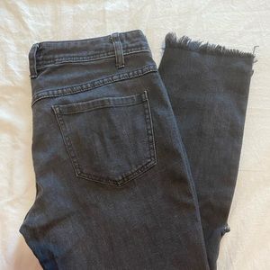 Free People black distressed skinny jeans. Size 29.